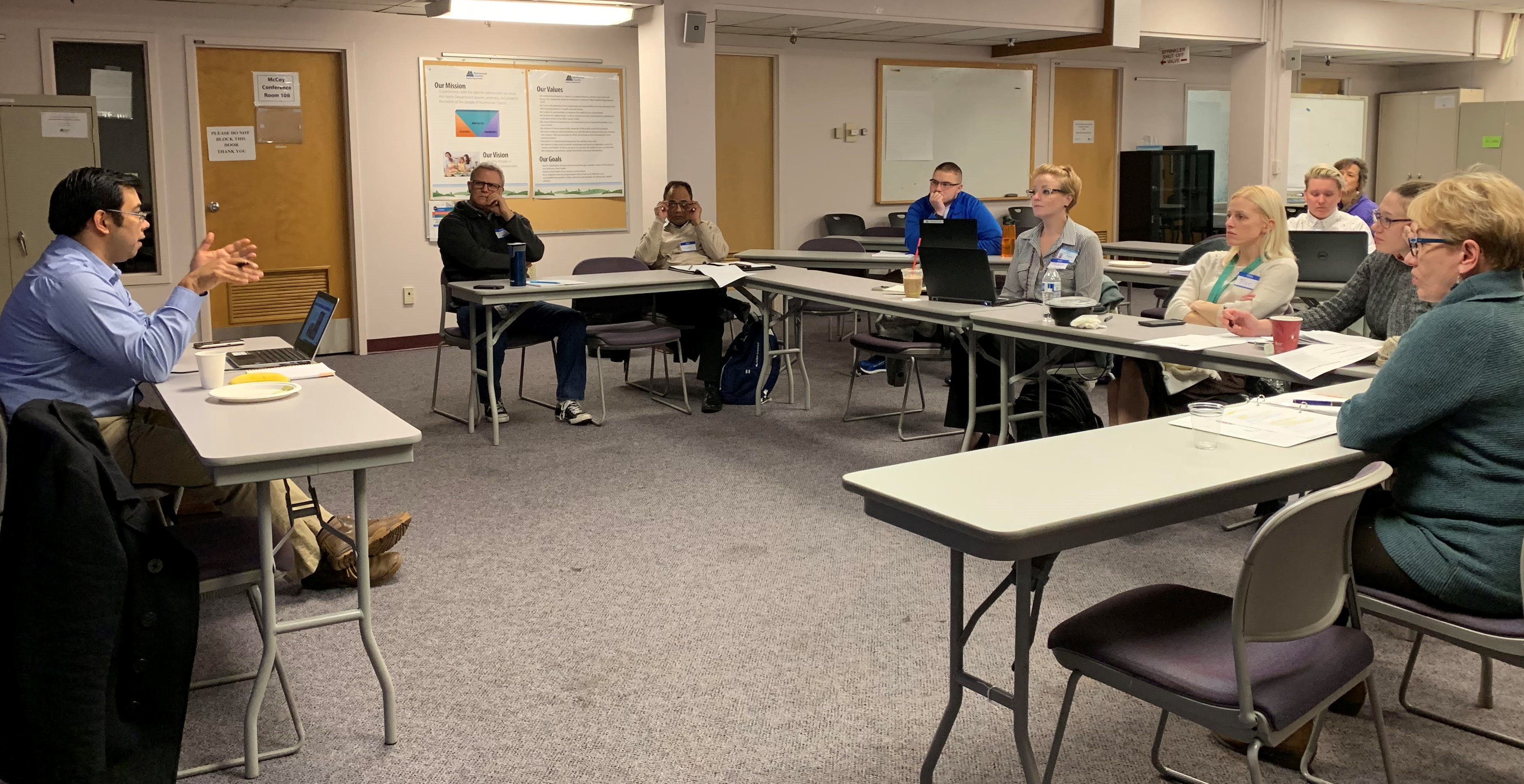 Photo of the team meeting for their Winter Convening